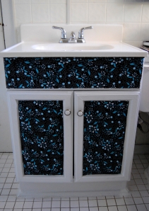 Fabric, Decoupage and Paint Bathroom Cabinet Makeover