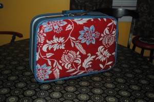 Decoupage suitcase using a pillow sham
