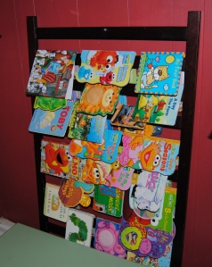 Repurposed Crib into a children's book rack